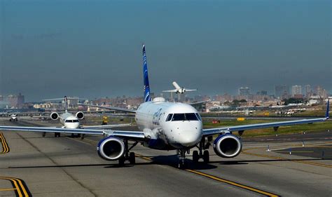 LaGuardia flights grounded as travelers told to expect delays into the night - Travel News ...