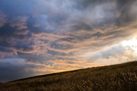 Background of the Sky with Clouds at Sunset with Ground Stock Image ...