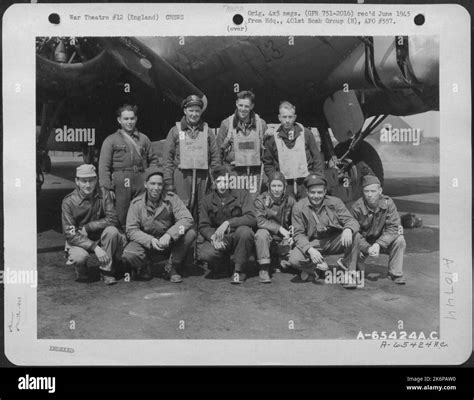 Crew Of The Boeing B 17 Flying Fortress Hells Angel Pose Beside Their Plane At A Base In