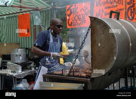 Barbecuing Jerk chicken Jamaican style at Notting Hill Carnival in West ...