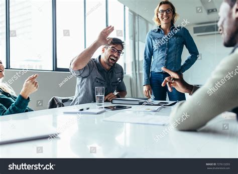 Happy Work Environment Photos and Images | Shutterstock