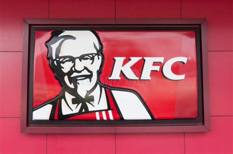 KFC logo on red background editorial stock photo. Image of bread - 23992708