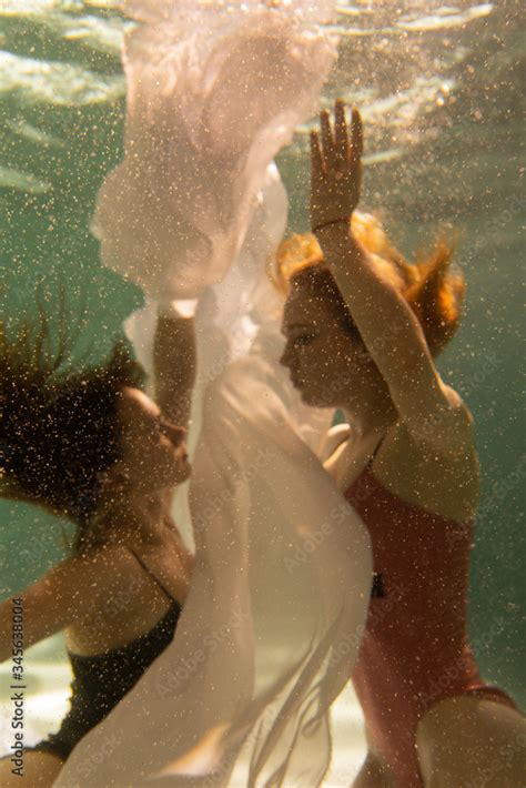 Two Beautiful Lesbian Girls Are Swimming Underwater Attractiveness