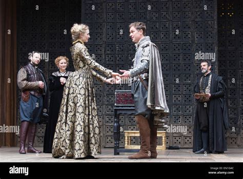 London, UK. 25 April 2015. L-R: David Sturzaker as Gratiano, Dorothea Myer-Bennet as Nerissa ...