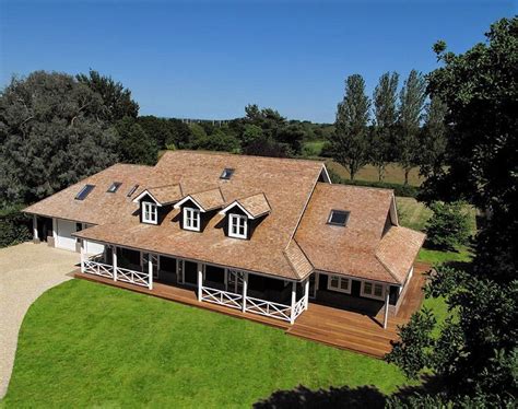 American Ranch Style House With Stunning Porch And Dormers