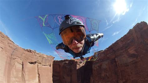 Wingsuiter Flys Through 20 Hole In Space Net Daniel Ristow YouTube