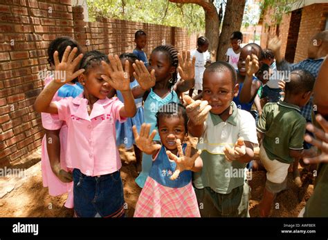 Children Showing Their Sandy Hands At A Kindergarten Gaborone