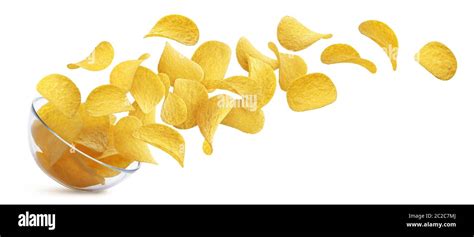 Potato Chips Falling Into Glass Bowl Isolated On White Background Stock