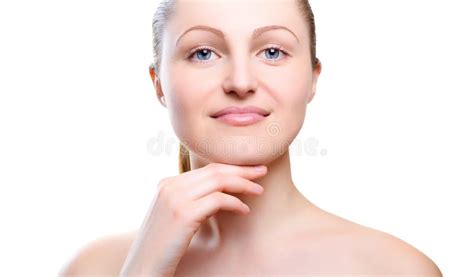 Portrait Of Girl With Nude Make Up With Hands On Chin Stock Photo