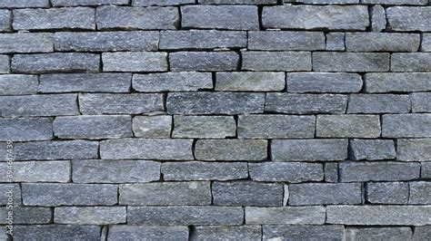 Grey brick wall - rubble stone texture Stock Photo | Adobe Stock