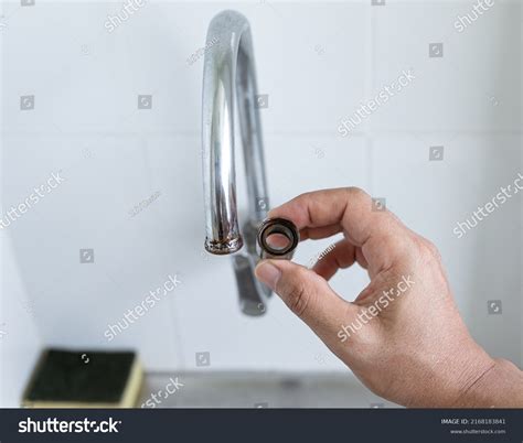 26 Hand Attaching A Faucet Isolated Stock Photos, Images & Photography | Shutterstock