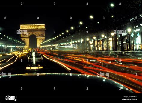 Paris At Night Night Time Looking Along The Champs Elysees Towards The