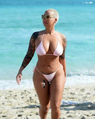 Amber Rose Busty And Booty Wearing String Bikini At The Beach In Miami