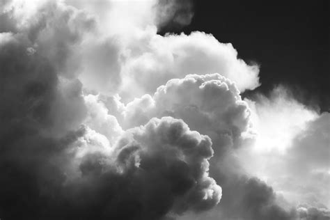 Black And White Sky With Building Storm Clouds Fine Art Print Photograph by Keith Webber Jr