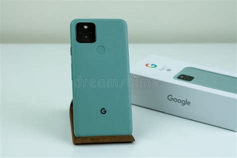 Google Pixel 5 in Sorta Sage Color Next To Its Box. Editorial Image ...