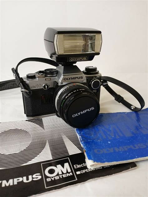 Olympus OM 10 35mm SLR Film Camera W Zuiko 50mm F 1 8 T20 Flash FC