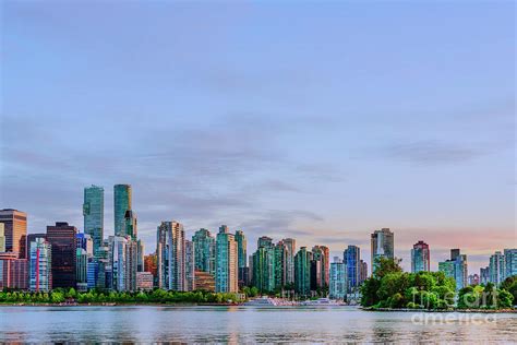 Vancouver skyline at sunset Photograph by Viktor Birkus