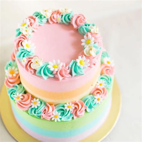 Pastel Rainbow Two Tier Cake With Fondant Daisies Tiered Cakes