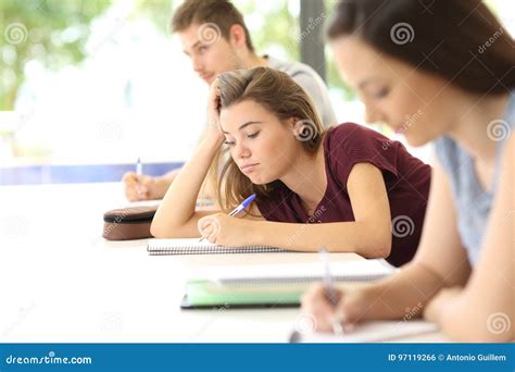 Distracted Student Drawing During A Class Stock Photo Image Of Female