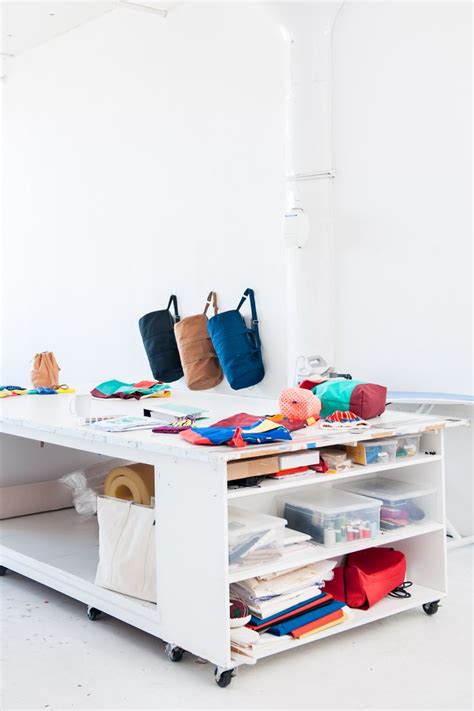 white table topped  lots   bags