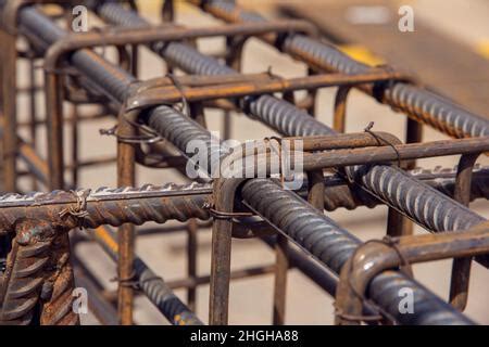 Assembly of reinforcing bars for pouring concrete. Industrial background. Rebar texture Steel ...