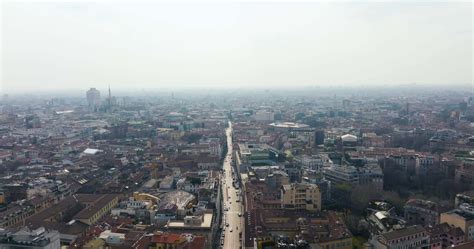 Aerial view of Milan city from above. Flying over Milan city center ...