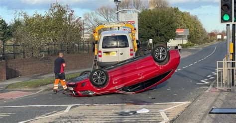 Road Closed And One Person Taken To Hospital After Car Overturns On