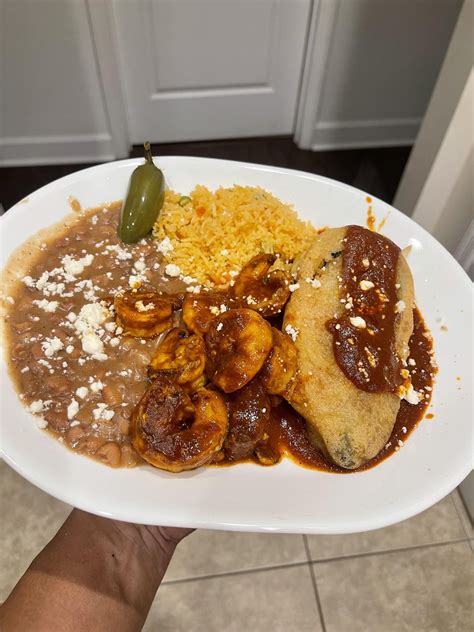 Homemade Shrimp Diablo Pinto Beans Mexican Rice And Egg Battered