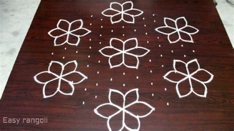 Flower Kolam Designs For Pongal With X Interlaced Dots Sankranti