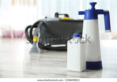 Professional Cleaning Supplies Equipment On Floor Stock Photo