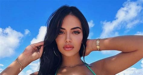 Model Wows In Skimpy Underboob Bikini Trend As Boobs Almost Spill Out