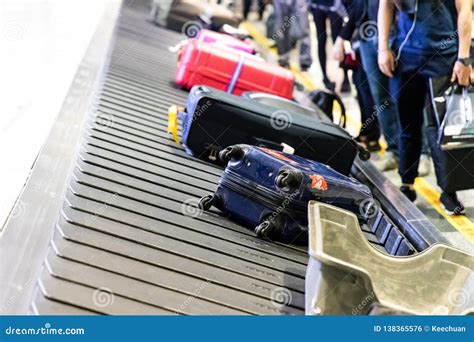 Baggage Luggage on Conveyor Carousel Belt at Airport Arrival Stock Photo - Image of flight ...