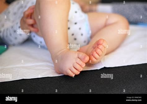 Baby Lies On Back Stock Photo Alamy