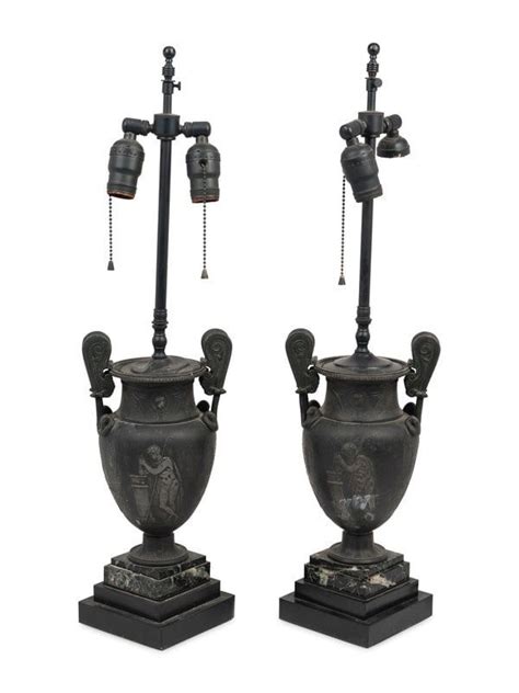 A Pair Of Grand Tour Style Cast Metal Urns Mounted As Lamps With Marble