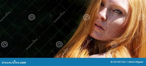 Closeup Wide Banner Portrait Of Beautiful Redhead Woman In The Summer