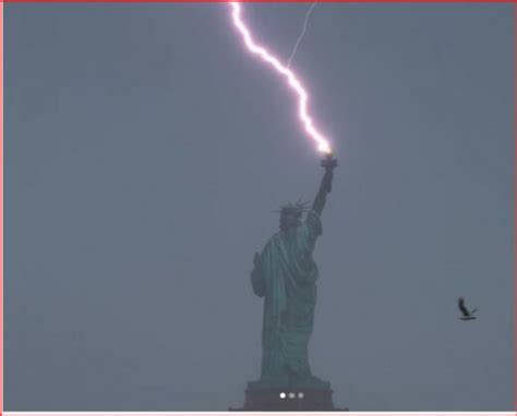 Capturing Natures Fury Lightning Strikes Statue Of Liberty During Nyc