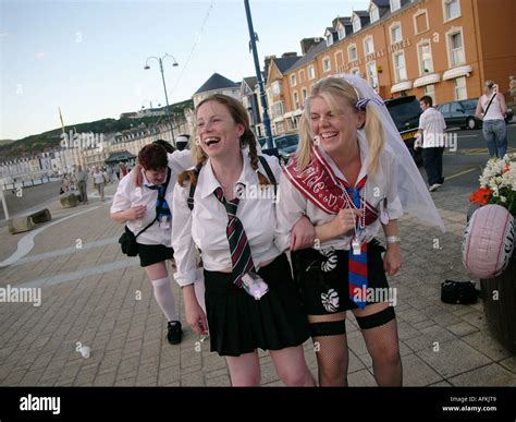 Laughing Adult Women Dressed As Naughty Schoolgirls On Hen Night Party Aberystwyth Ceredigion