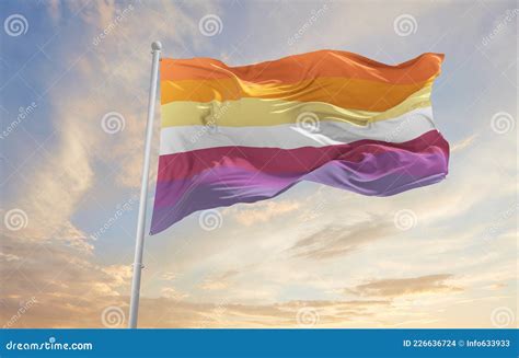 Nonbinary Lesbian Pride Flag Waving In The Wind At Cloudy Sky Freedom