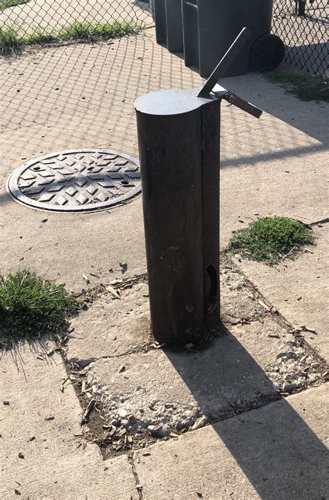 what is this weird metal thing at my local dog park? can’t open it, no
