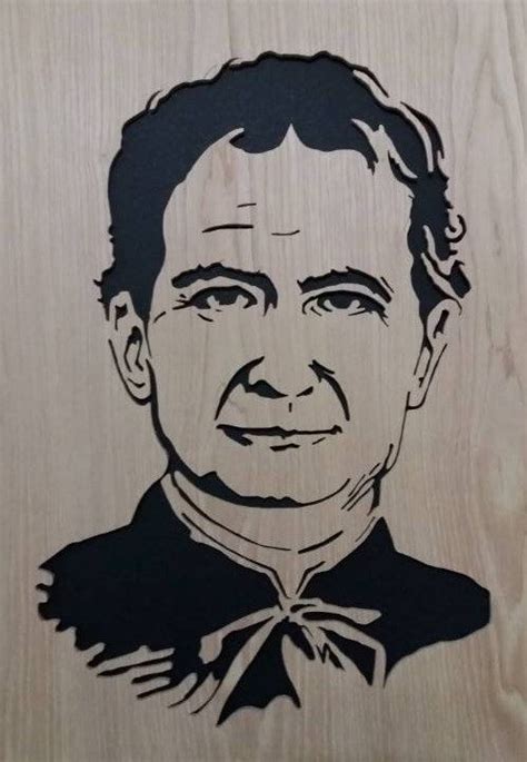 An Image Of A Man In A Bow Tie On A Wooden Plaque With Black Ink