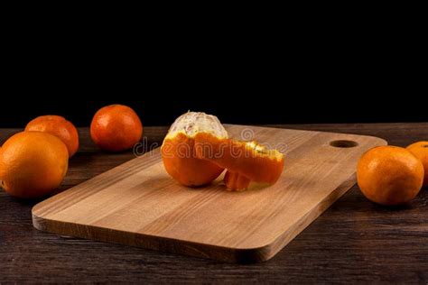 Half Peeled Orange On A Cutting Board Stock Photo Image Of Fresh