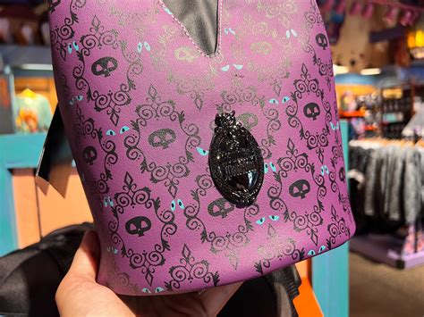 Be Spooky And Stylish With New Haunted Mansion Loungefly Bag