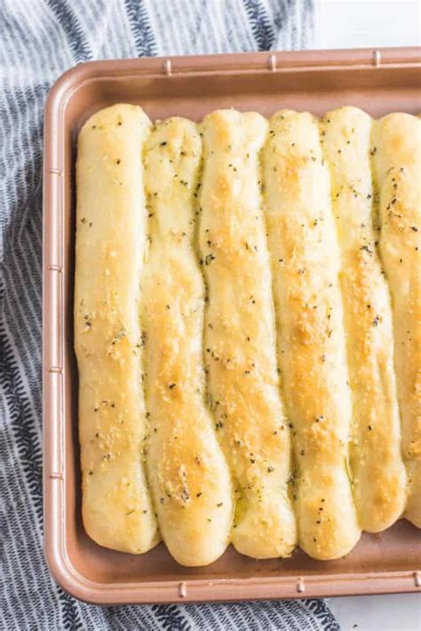 Soft And Fluffy Garlic Butter Breadsticks Recipe Wanderzest