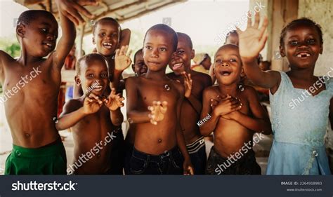 Group African Children Laughing Jumping Waving Stock Photo 2264918983