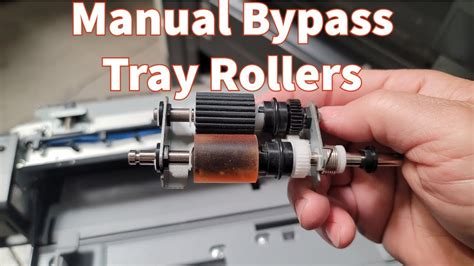 How To Replace The Manual Bypass Tray Rollers On Konica Bizhub Copiers