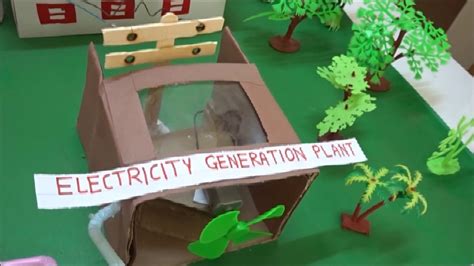 an open cardboard box sitting on top of a green table next to trees and potted plants