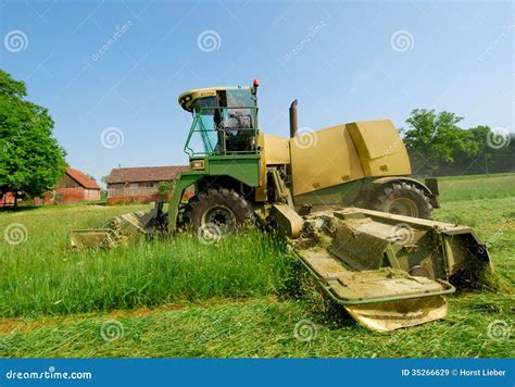 Tractor Cutting The Grass Royalty-Free Stock Photo | CartoonDealer.com ...