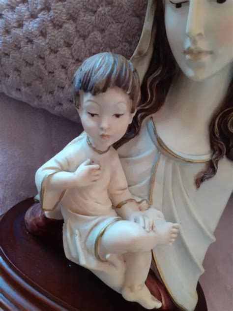 BELLE SCULPTURE VIERGE A L enfant signée amilcare santini Résine Bois