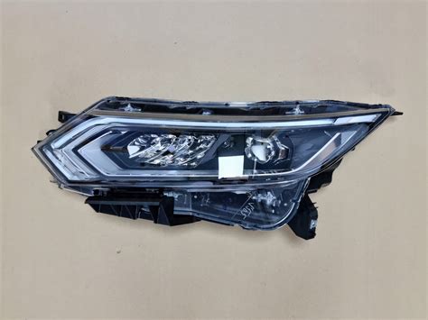 Nissan OE 26060HV05B reflektor LAMPA LEWA QASHQAI II J11 NOWA ORYGINAŁ