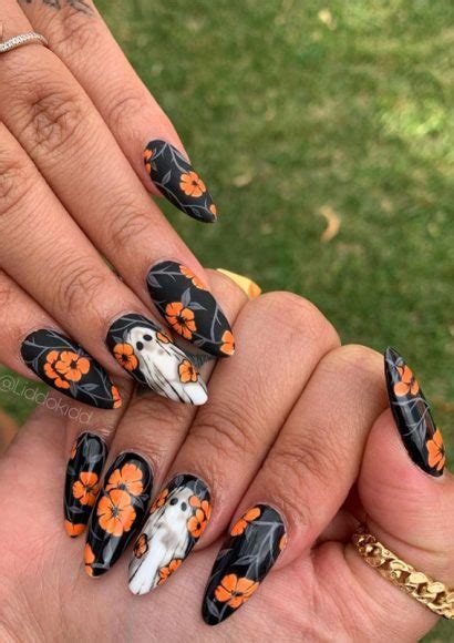 40 Wickedly Halloween Nail Art Ideas Orange Flower Pattern Matte And Glossy Nails